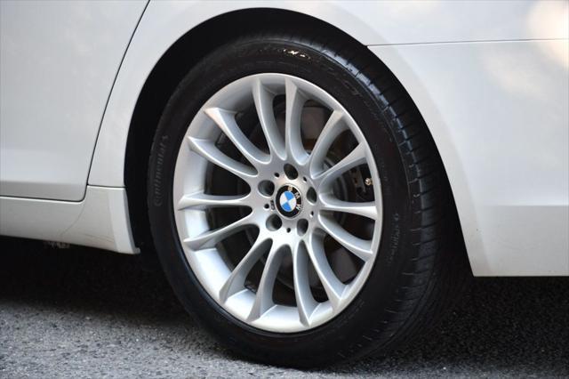 used 2012 BMW 750 car, priced at $10,995