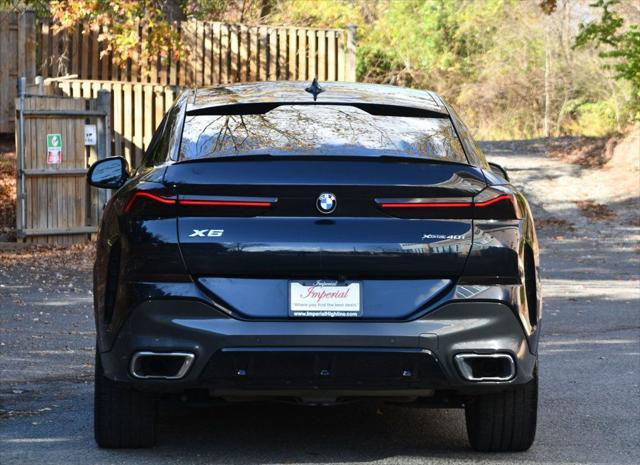 used 2022 BMW X6 car, priced at $54,995