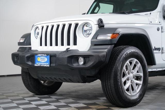 used 2023 Jeep Wrangler car, priced at $28,451