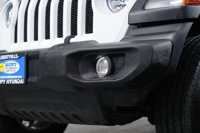 used 2023 Jeep Wrangler car, priced at $28,451