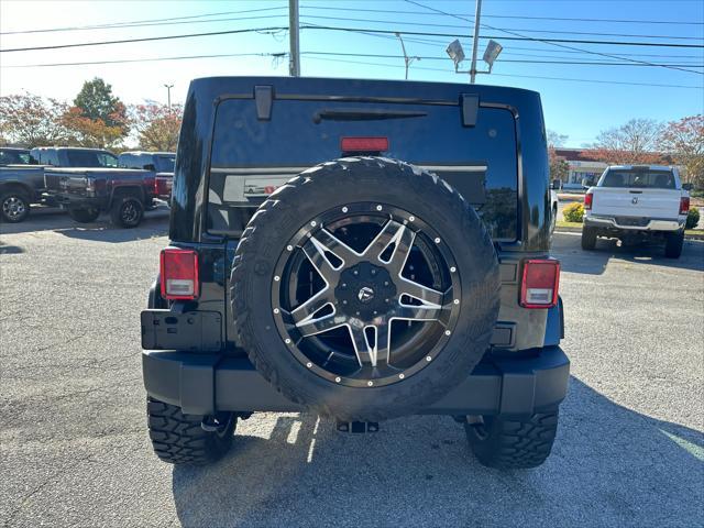 used 2016 Jeep Wrangler Unlimited car, priced at $26,800