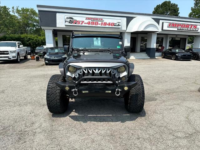 used 2013 Jeep Wrangler Unlimited car, priced at $16,800