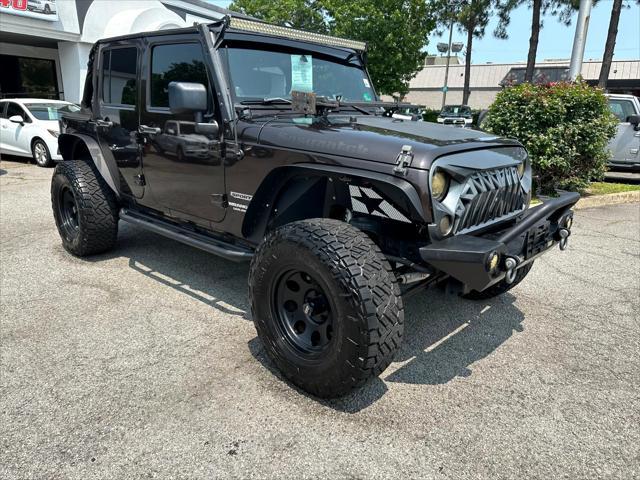 used 2013 Jeep Wrangler Unlimited car, priced at $16,800