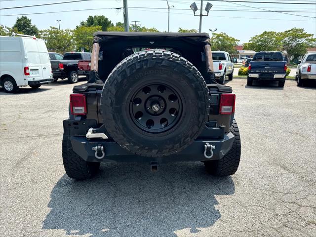 used 2013 Jeep Wrangler Unlimited car, priced at $16,800