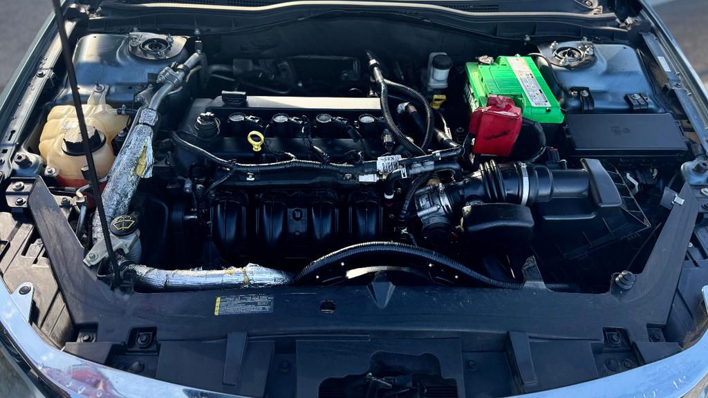 used 2012 Ford Fusion car, priced at $5,792