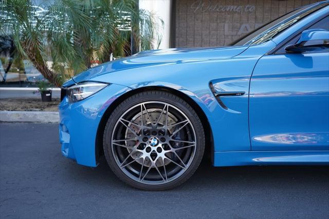 used 2018 BMW M4 car, priced at $45,491