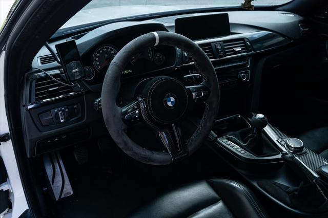 used 2015 BMW M4 car, priced at $43,991