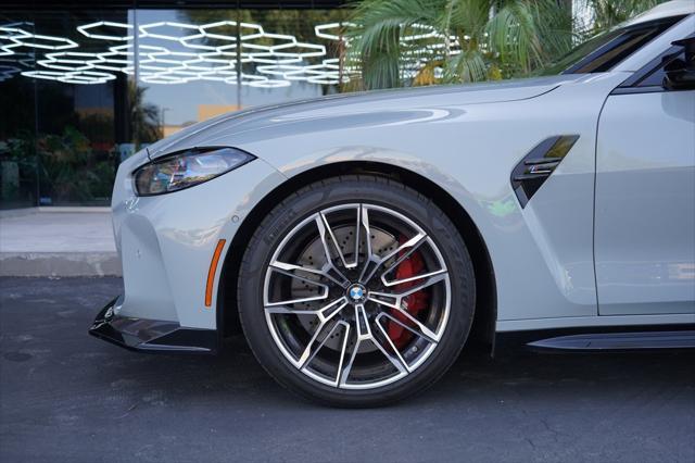 used 2024 BMW M4 car, priced at $89,991