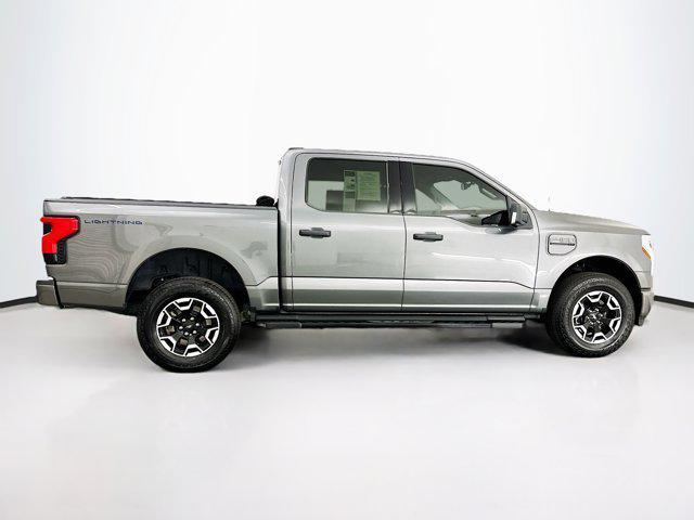 used 2022 Ford F-150 Lightning car, priced at $34,999