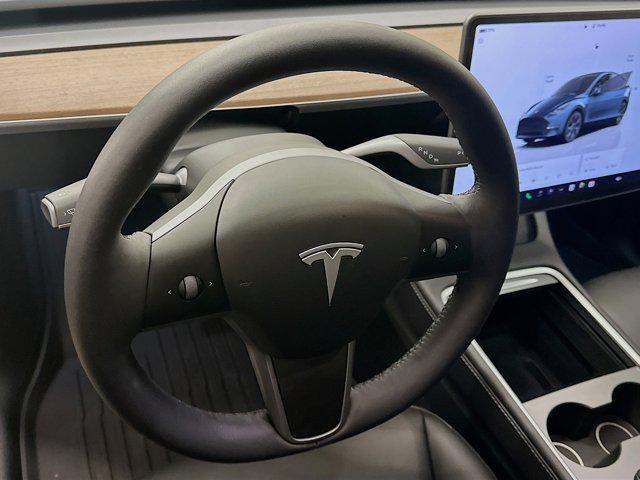 used 2025 Tesla Model Y car, priced at $39,897