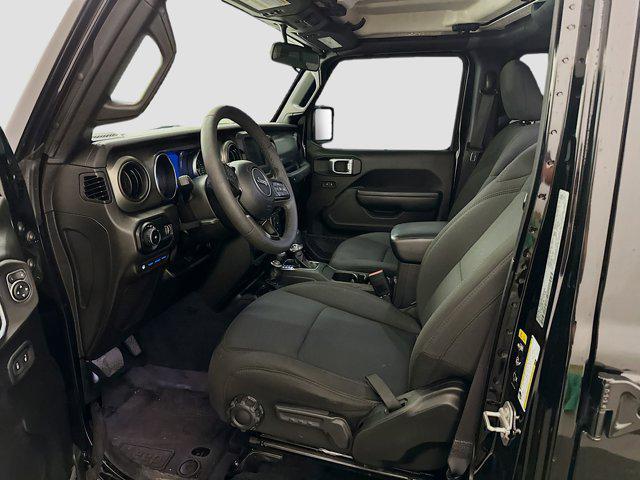 used 2023 Jeep Wrangler 4xe car, priced at $28,487