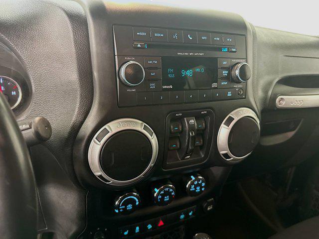 used 2015 Jeep Wrangler Unlimited car, priced at $18,299