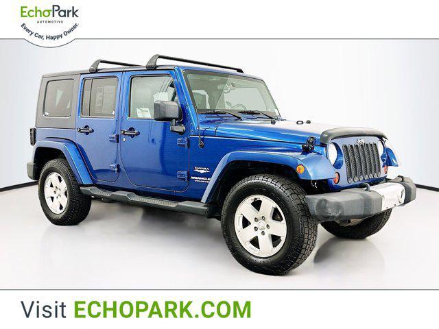 used 2010 Jeep Wrangler Unlimited car, priced at $11,299