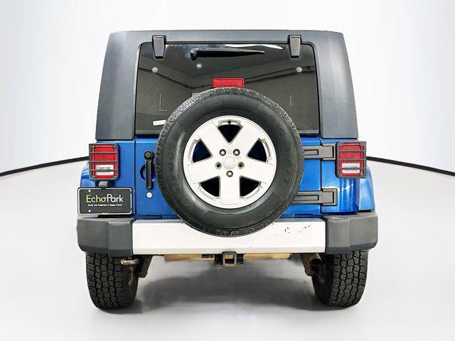 used 2010 Jeep Wrangler Unlimited car, priced at $10,299