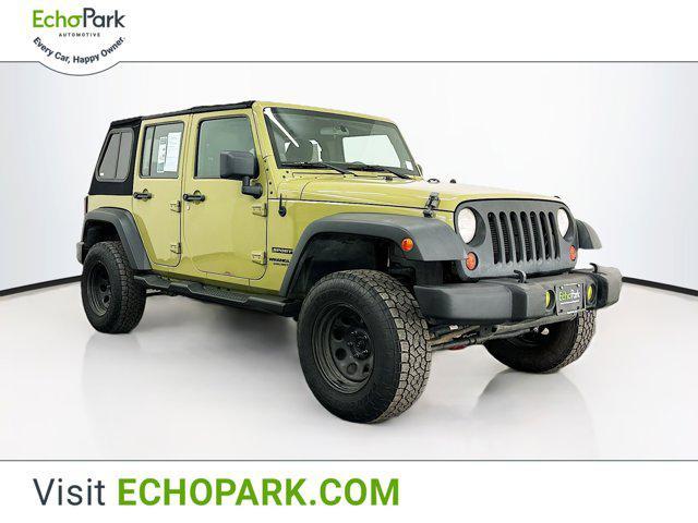 used 2013 Jeep Wrangler Unlimited car, priced at $18,899