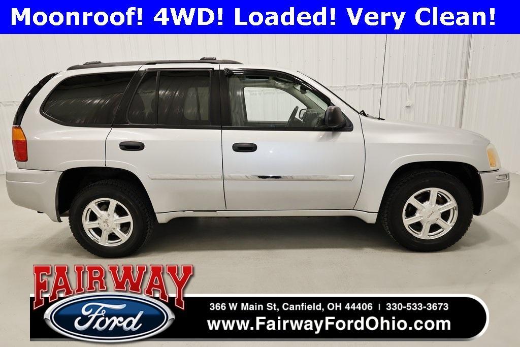 used 2009 GMC Envoy car, priced at $9,800
