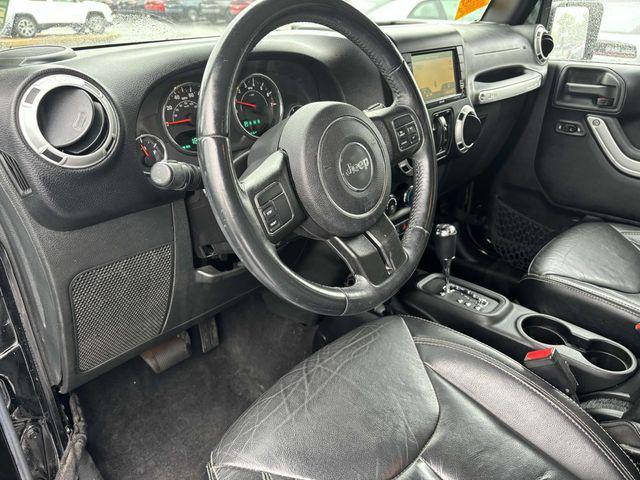 used 2015 Jeep Wrangler Unlimited car, priced at $16,395