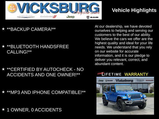 used 2023 Jeep Wrangler 4xe car, priced at $33,995