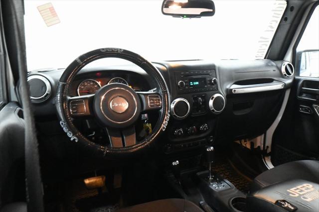used 2015 Jeep Wrangler Unlimited car, priced at $15,500