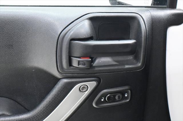 used 2015 Jeep Wrangler Unlimited car, priced at $15,500