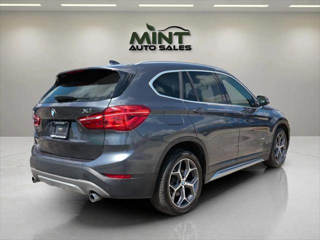 used 2018 BMW X1 car, priced at $11,495