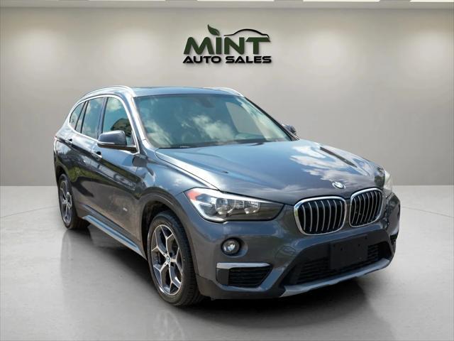 used 2018 BMW X1 car, priced at $11,495