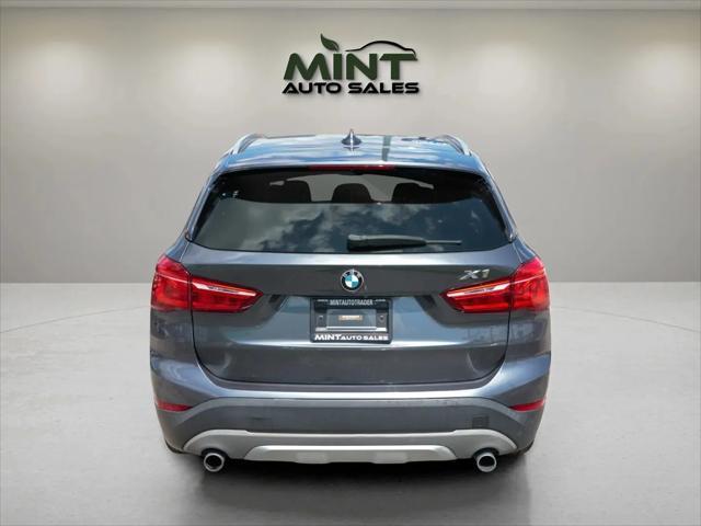 used 2018 BMW X1 car, priced at $11,495