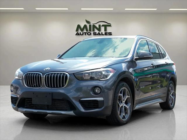 used 2018 BMW X1 car, priced at $11,495