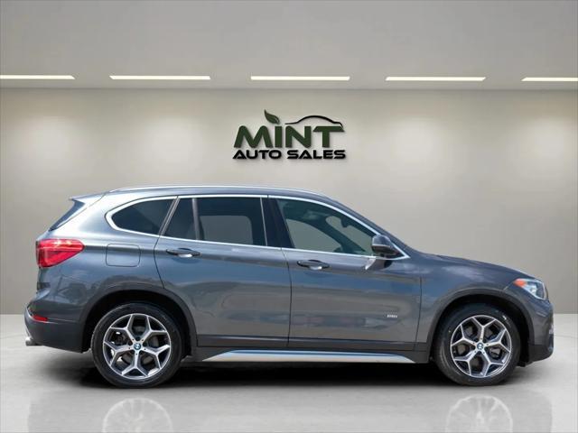 used 2018 BMW X1 car, priced at $11,495