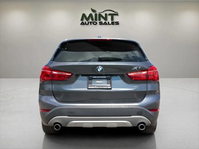 used 2018 BMW X1 car, priced at $11,495