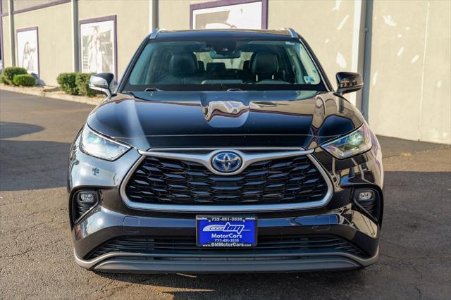 used 2021 Toyota Highlander Hybrid car, priced at $23,900