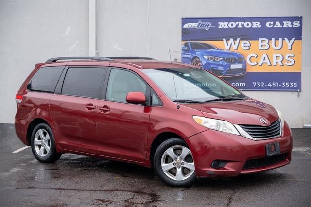used 2011 Toyota Sienna car, priced at $6,900