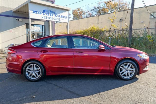 used 2016 Ford Fusion car, priced at $10,900