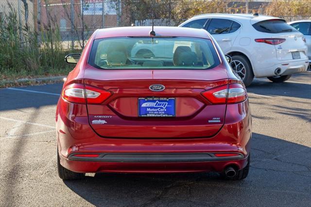 used 2016 Ford Fusion car, priced at $10,900