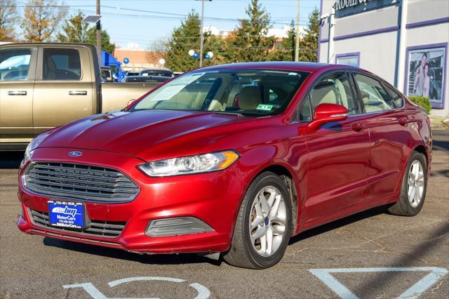 used 2016 Ford Fusion car, priced at $10,900