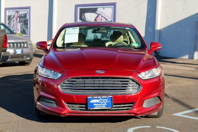 used 2016 Ford Fusion car, priced at $10,900