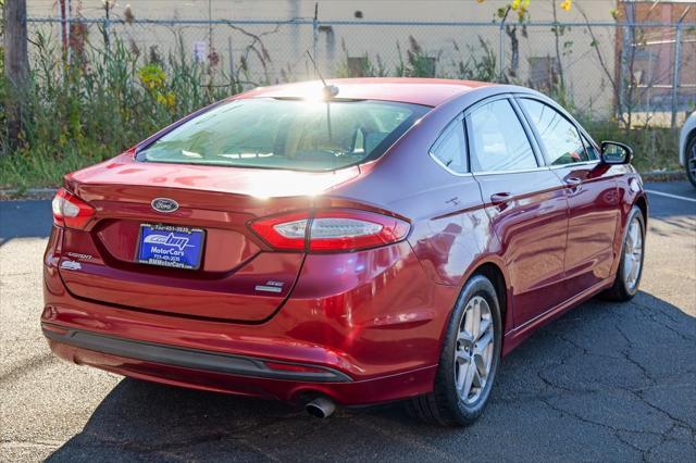 used 2016 Ford Fusion car, priced at $10,900