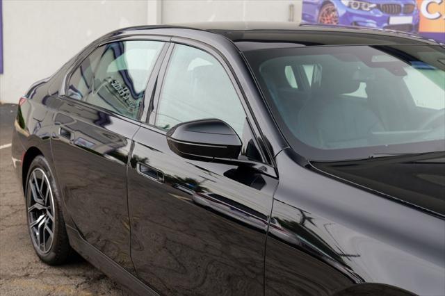 used 2024 BMW 740 car, priced at $73,900