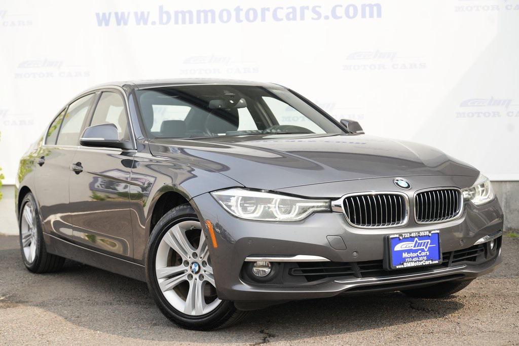used 2018 BMW 330 car, priced at $14,700