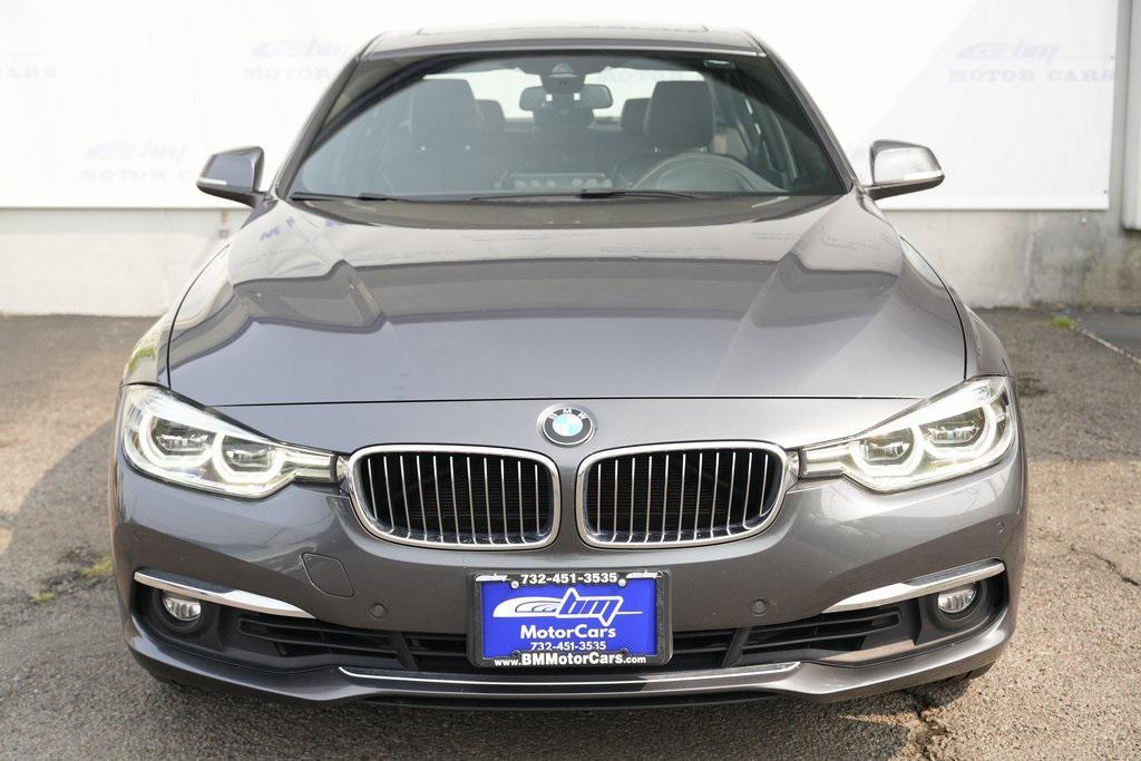 used 2018 BMW 330 car, priced at $12,900