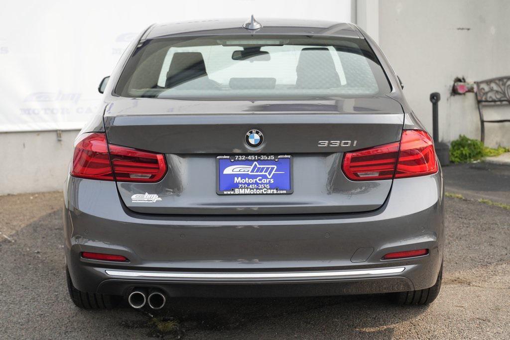 used 2018 BMW 330 car, priced at $12,900