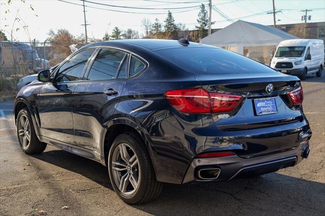 used 2019 BMW X6 car, priced at $27,700