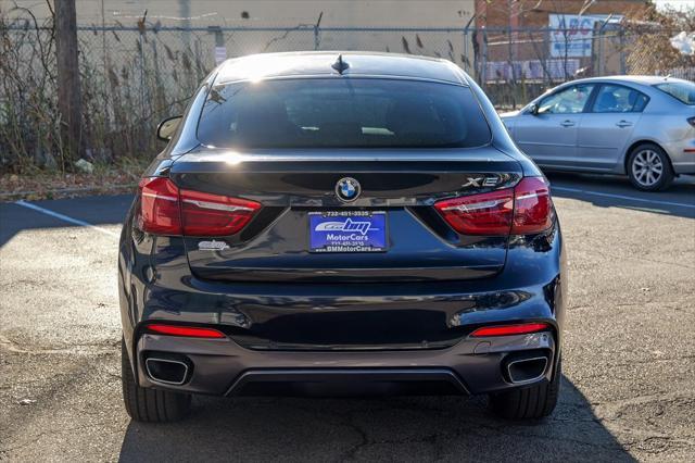 used 2019 BMW X6 car, priced at $27,700