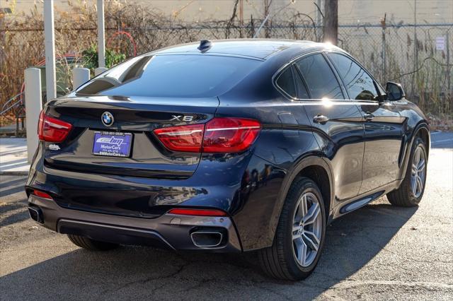 used 2019 BMW X6 car, priced at $27,700