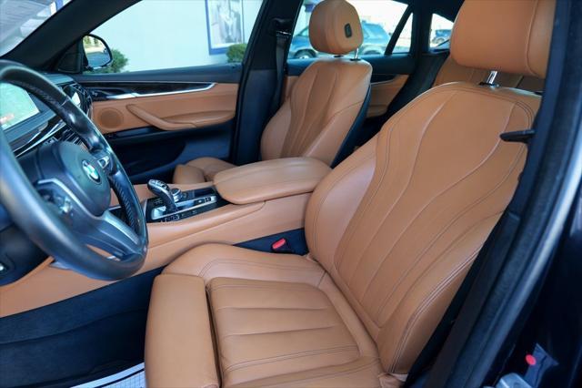 used 2019 BMW X6 car, priced at $27,700