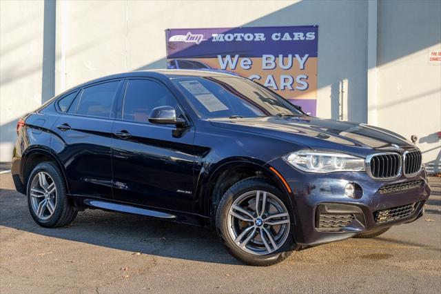 used 2019 BMW X6 car, priced at $27,700