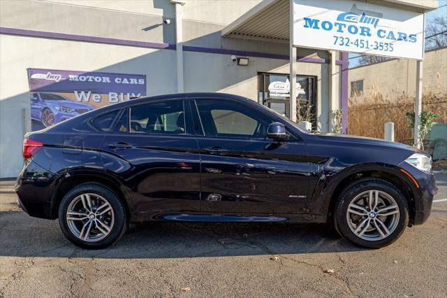 used 2019 BMW X6 car, priced at $27,700