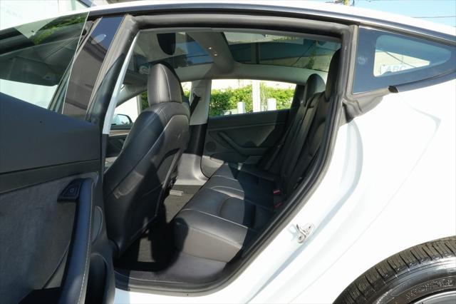 used 2023 Tesla Model 3 car, priced at $23,500