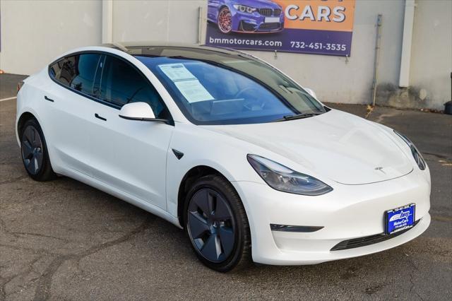 used 2022 Tesla Model 3 car, priced at $21,900