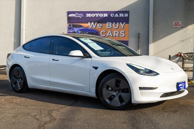 used 2022 Tesla Model 3 car, priced at $21,900